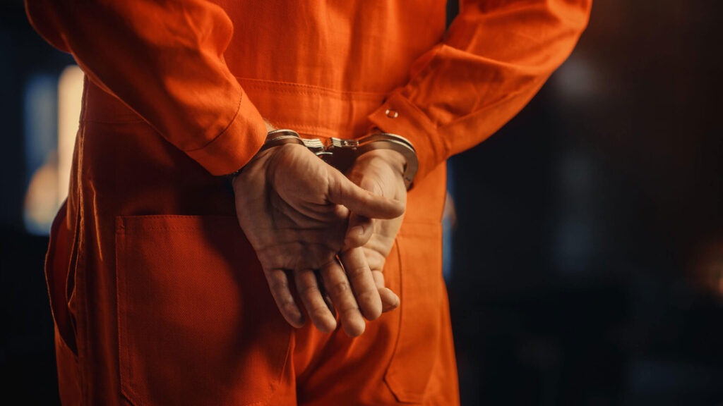 Criminal defendant in handcuffs