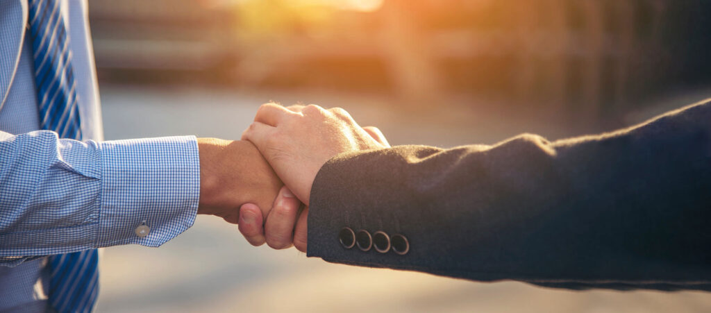 Lawyer and client shaking hands