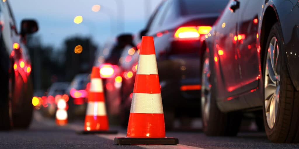 Vehicles waiting to go through a DUI checkpoint