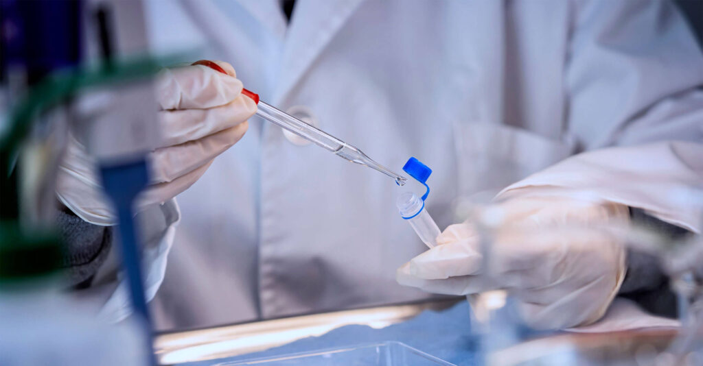 Crime laboratory technician analyzes DNA evidence