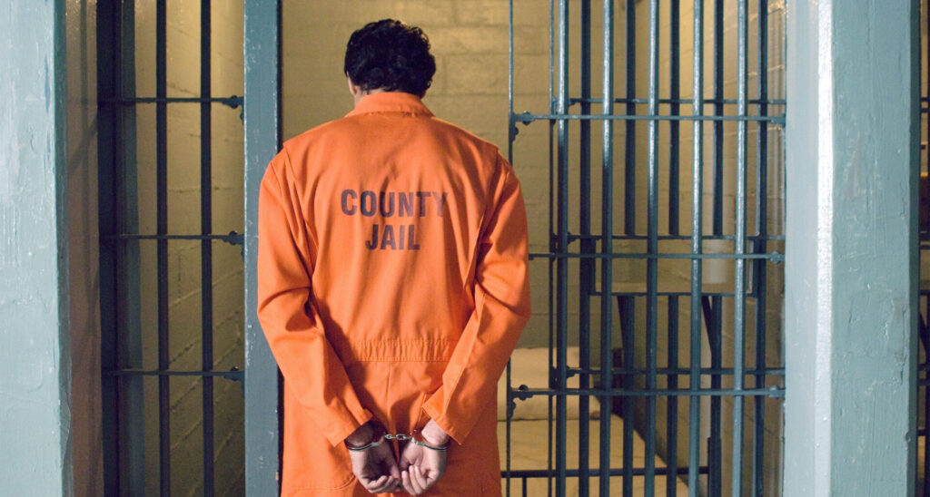 Prisoner entering the county jail after being arrested for shoplifting