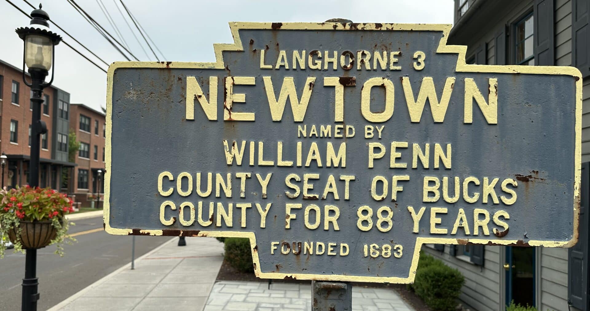 Historic Newtown Borough sign marking Newtown as the former Bucks County seat.